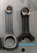 Stock M57 connecting rod on the right. 
